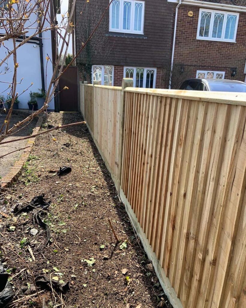 This is a photo of feather edge fencing installed in a residential property by Fast Fix Fencing Brandon